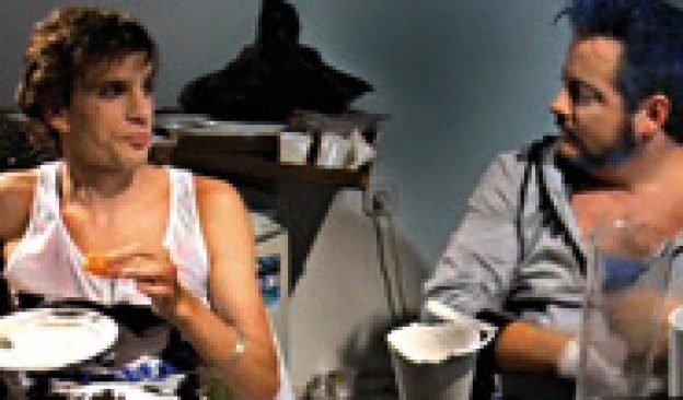 Still from Changing Direction: two men talking at a table
